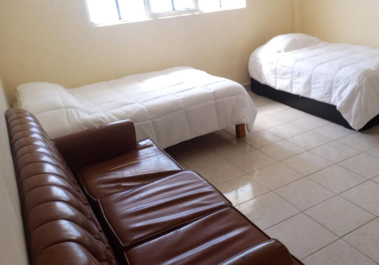 Hostal Las Quince Letras เตฮัวกัน ภายนอก รูปภาพ