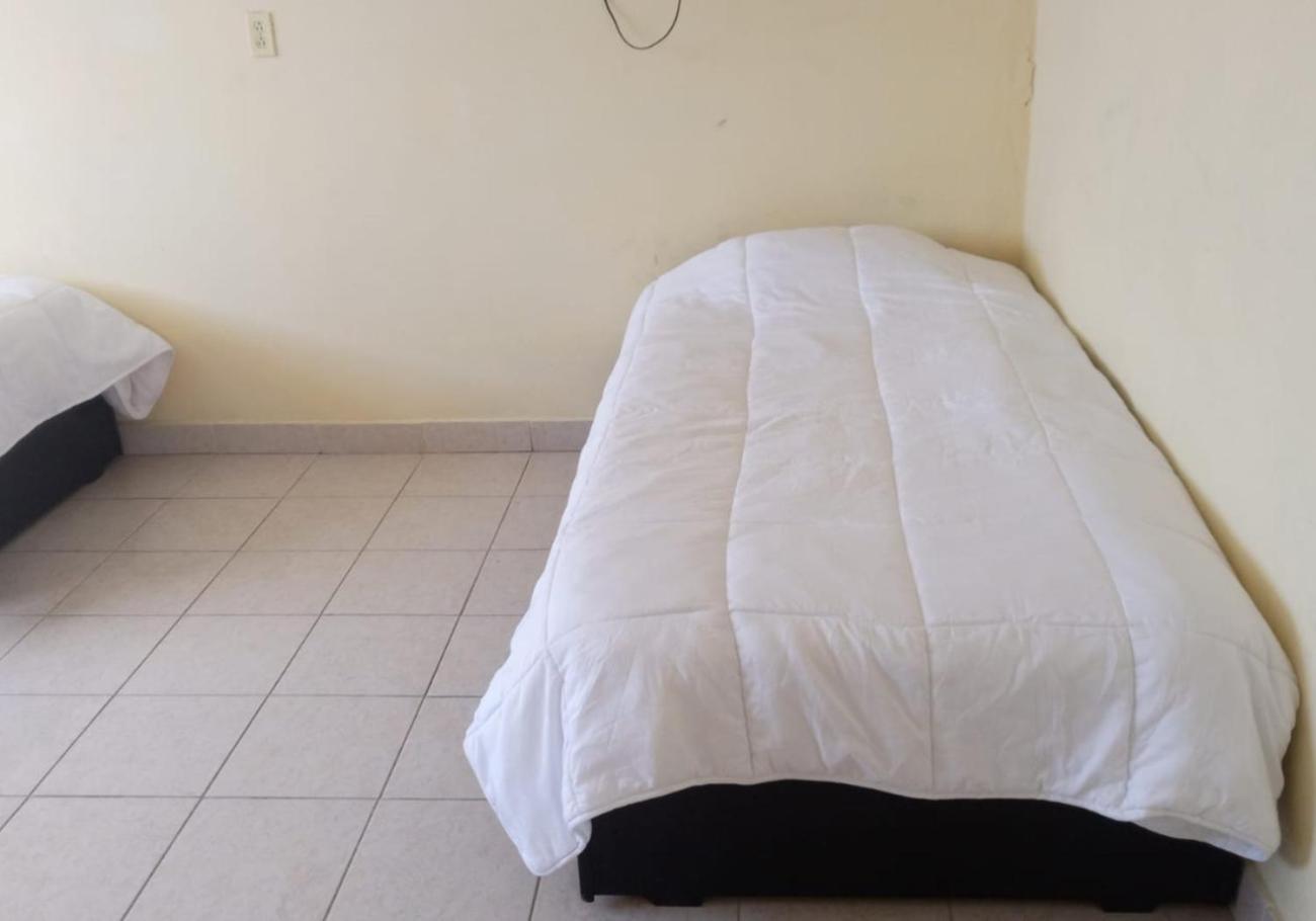 Hostal Las Quince Letras เตฮัวกัน ภายนอก รูปภาพ